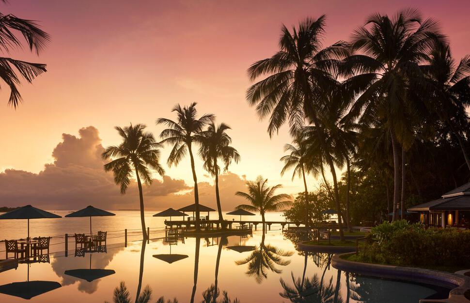 Luxury hotel exterior with pool